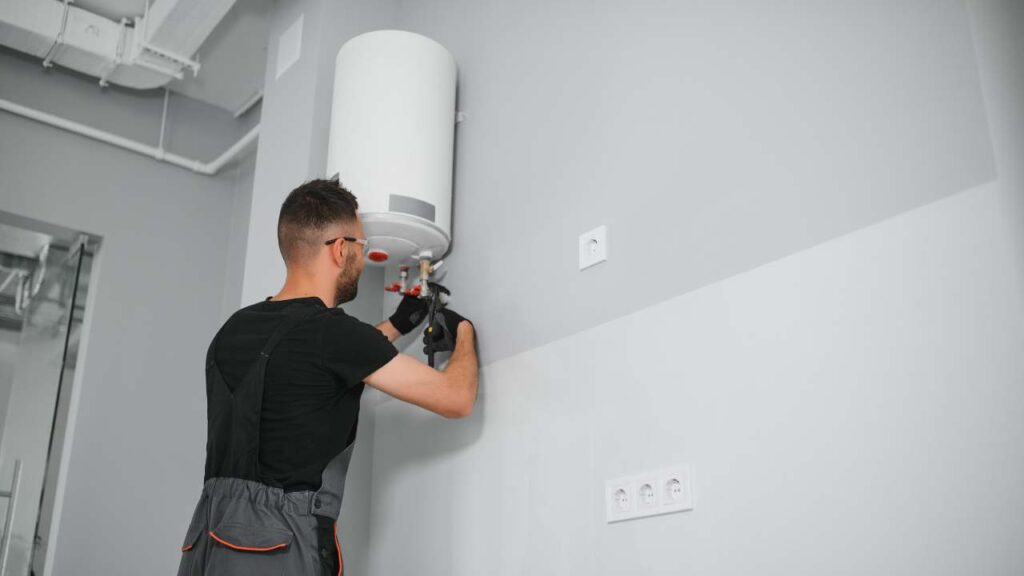 Emergency gas plumber inspecting gas line leak in Vancouver home