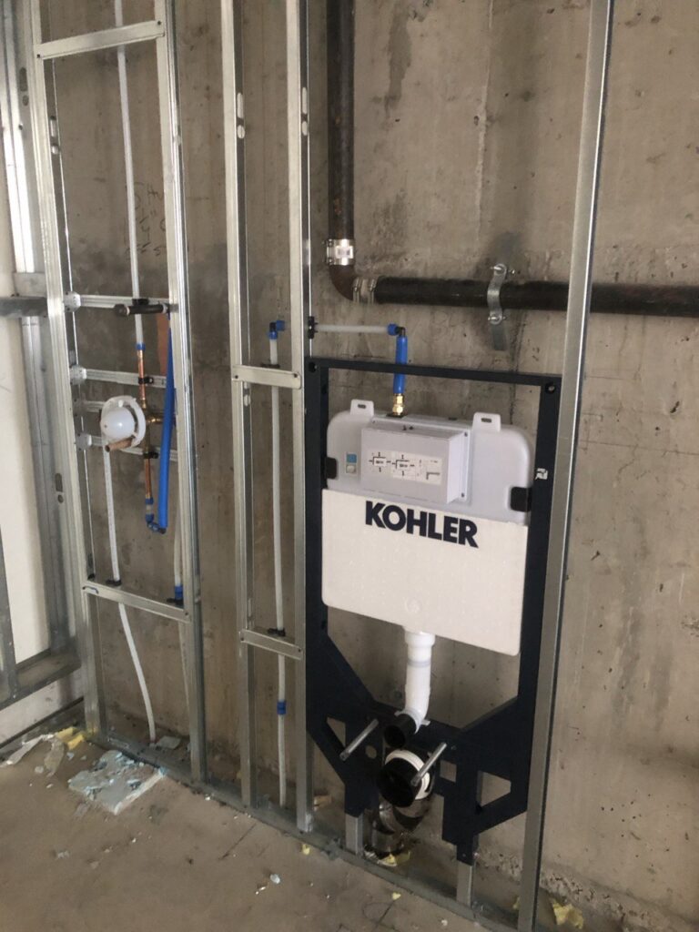 Bathroom Plumbing Rough-In with Wall-Mounted Toilet System