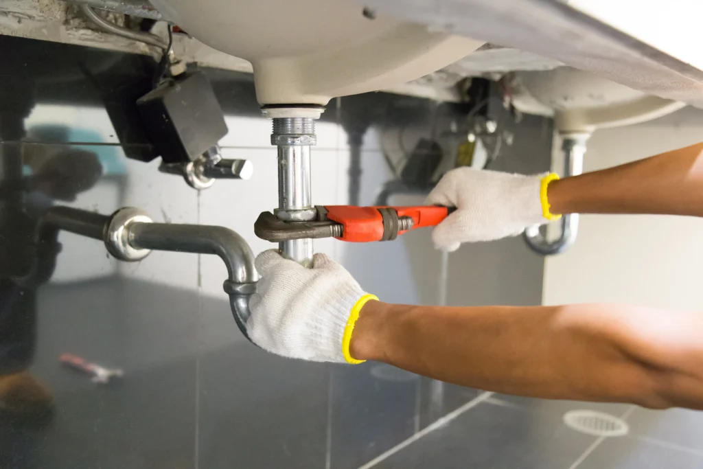 plumber-installing-kitchen-sink-vancouver